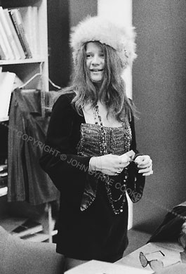 Janis standing, in fur hat